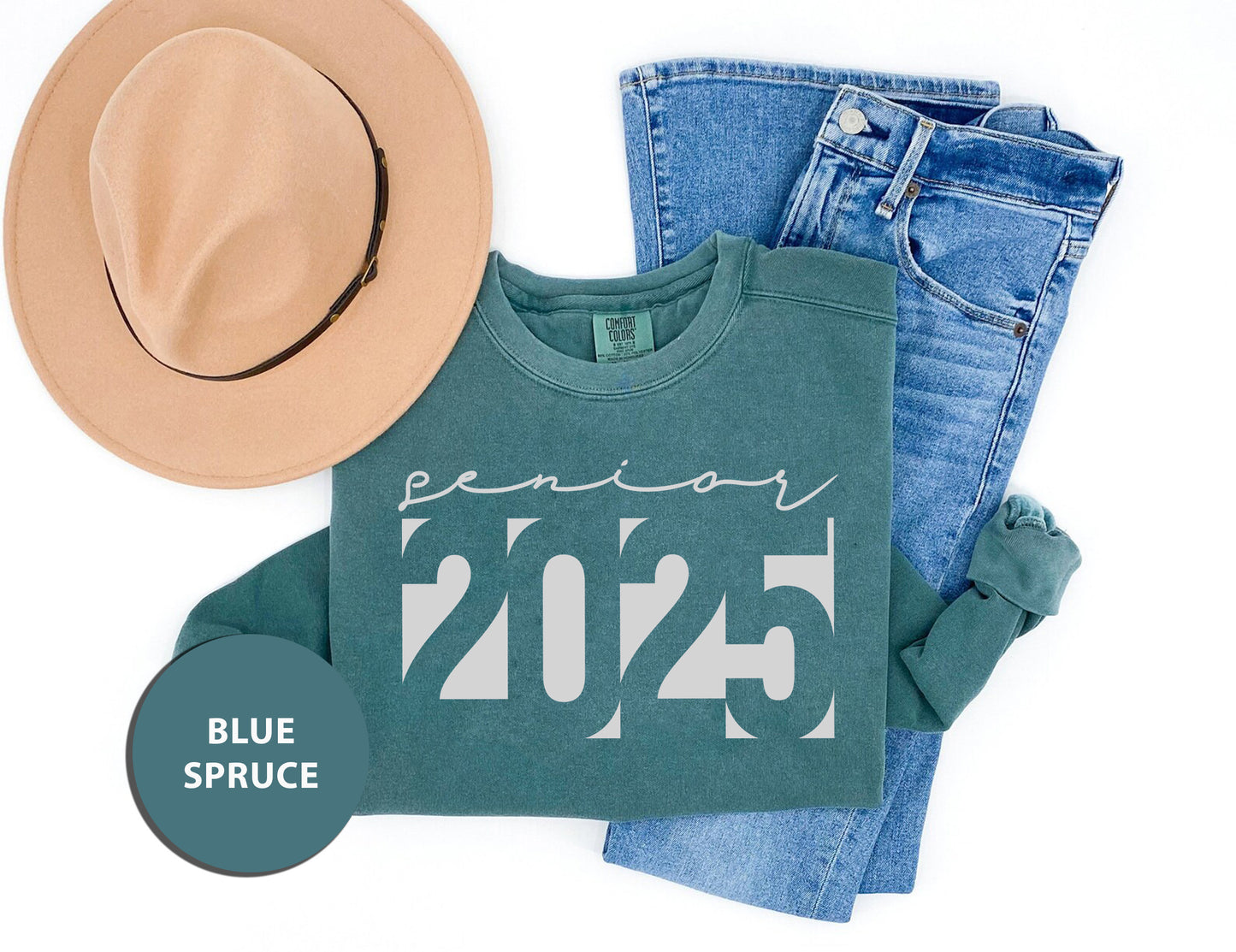 a pair of jeans, a hat, and a t - shirt on a white