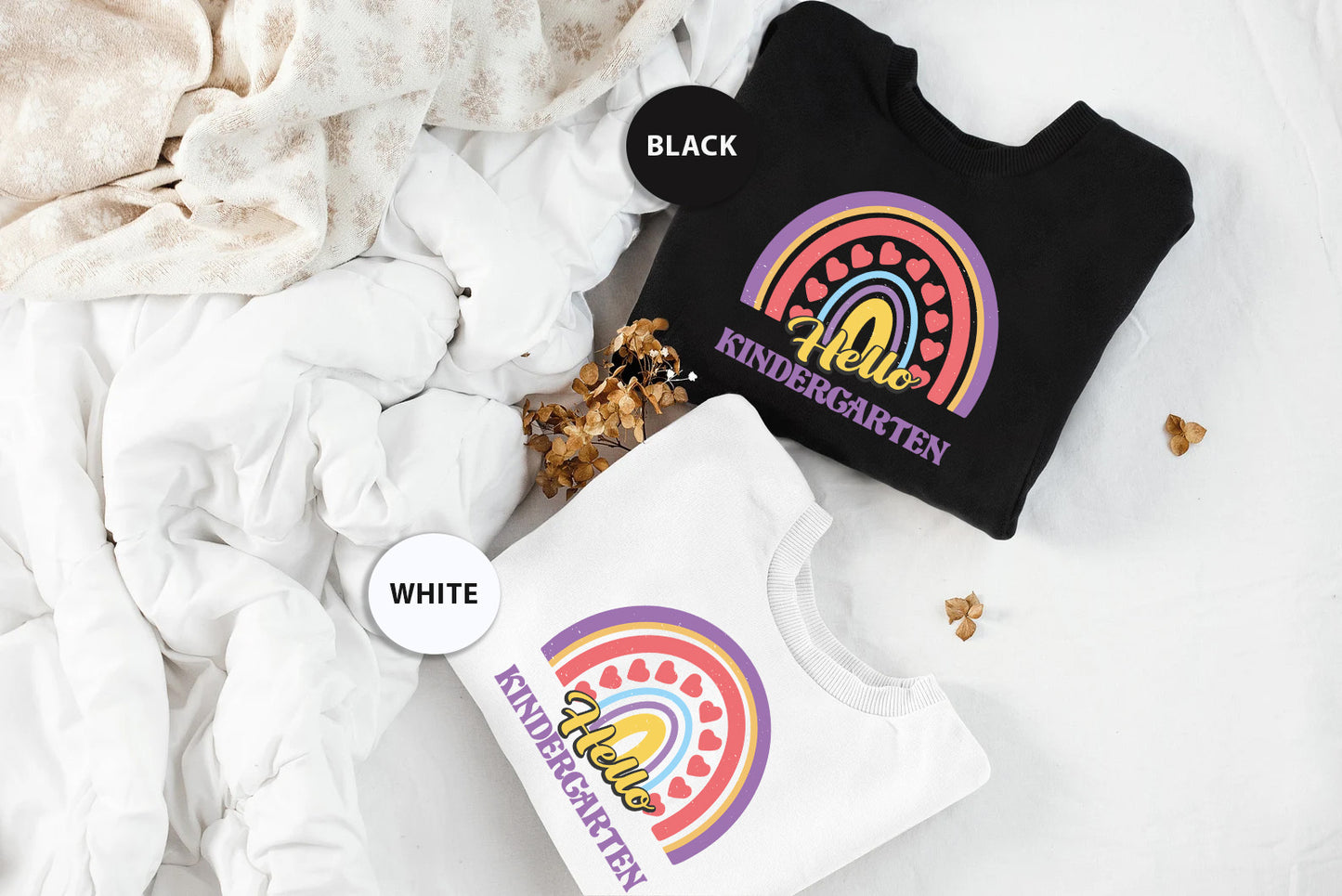 a t - shirt and a bag of popcorn on a bed