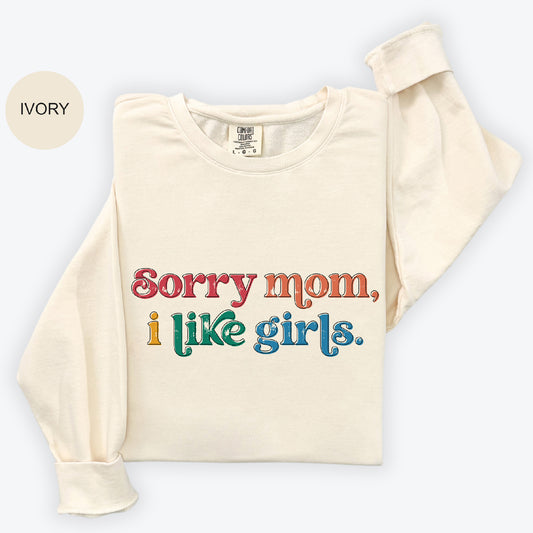 a white shirt that says sorry mom i like girls
