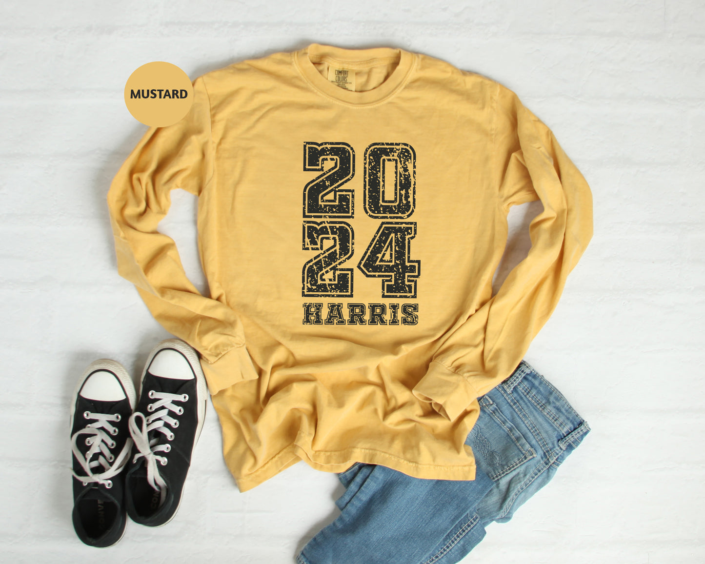 a pair of black sneakers and a yellow shirt