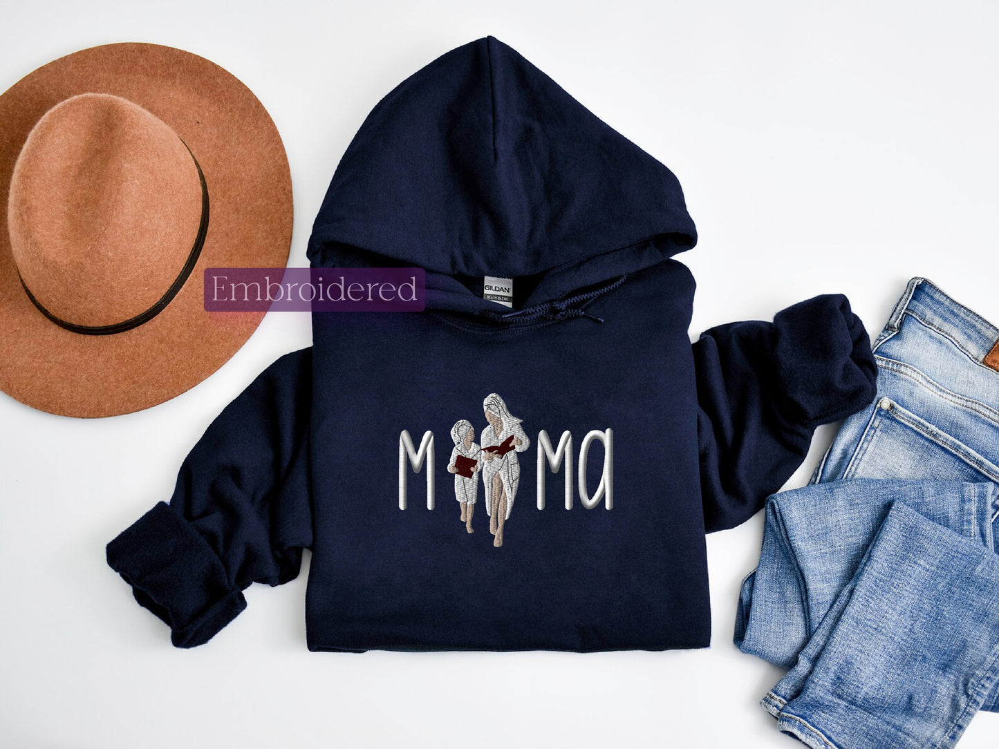a hoodie with a cowboy hat and jeans