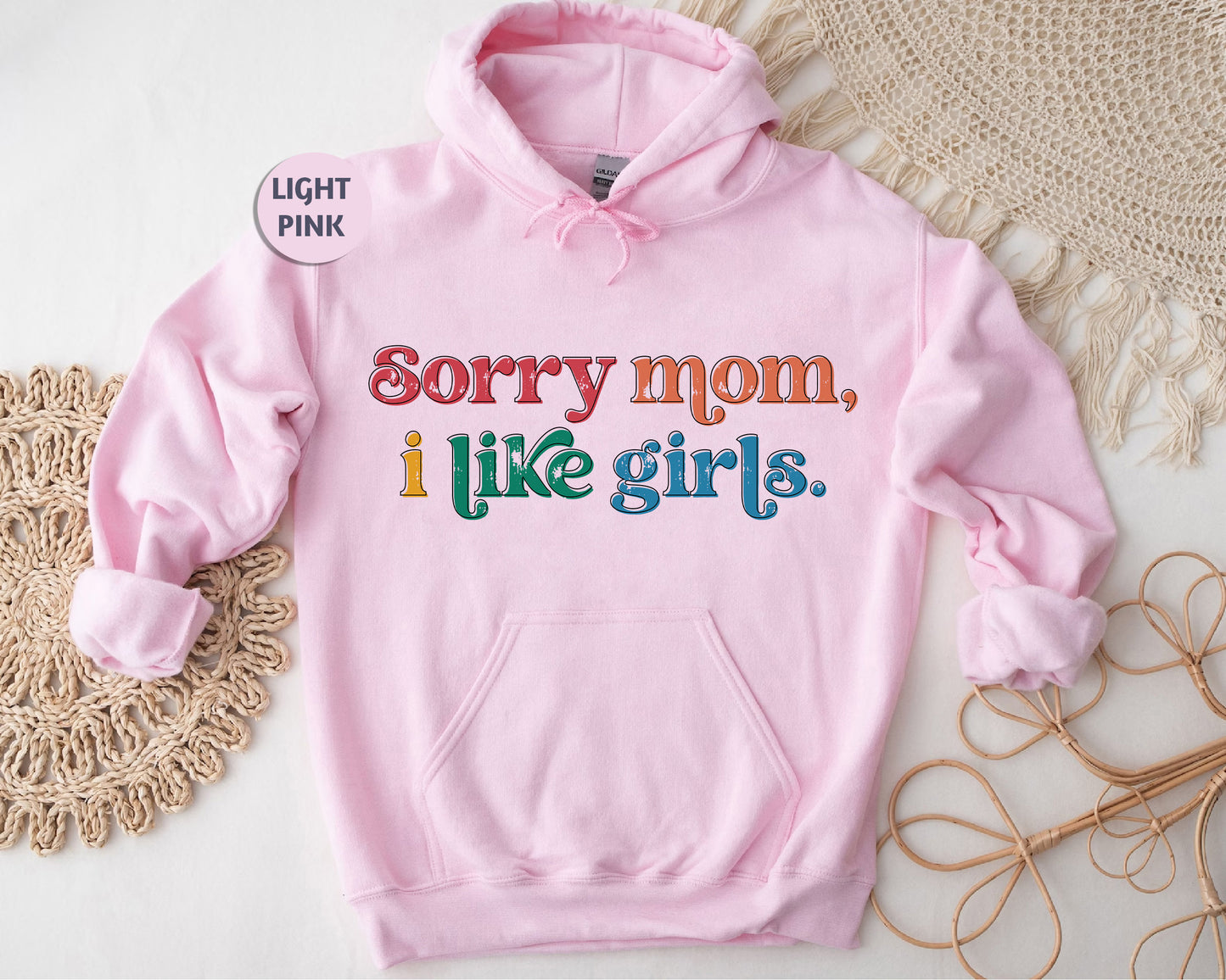 a pink hoodie that says sorry mom, i like girls