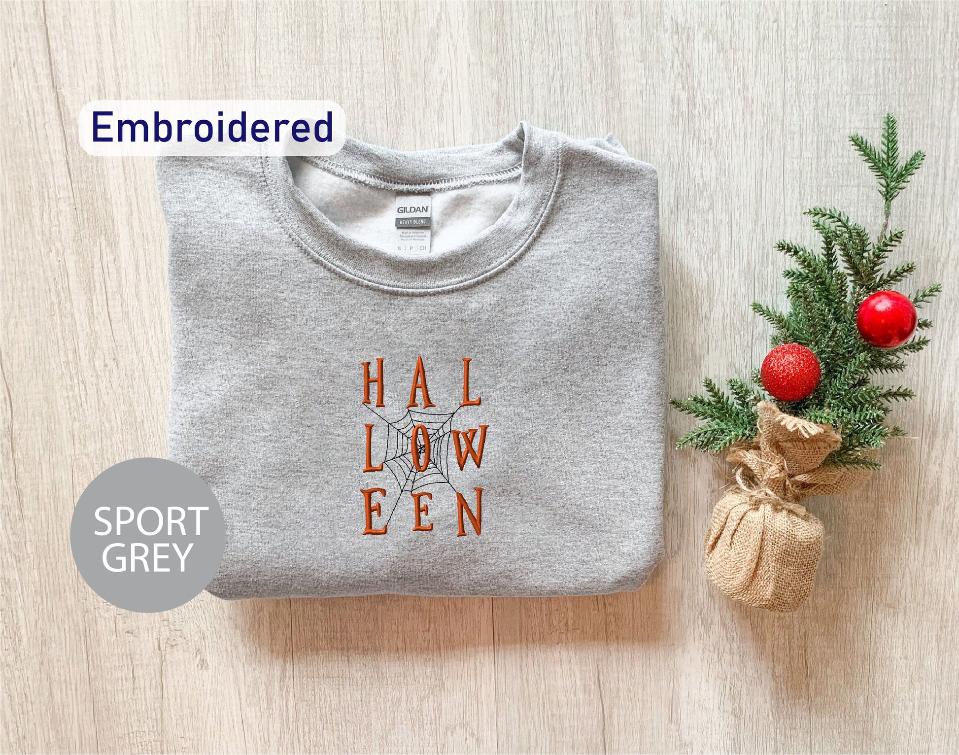 a t - shirt with the words hallow een on it next to a