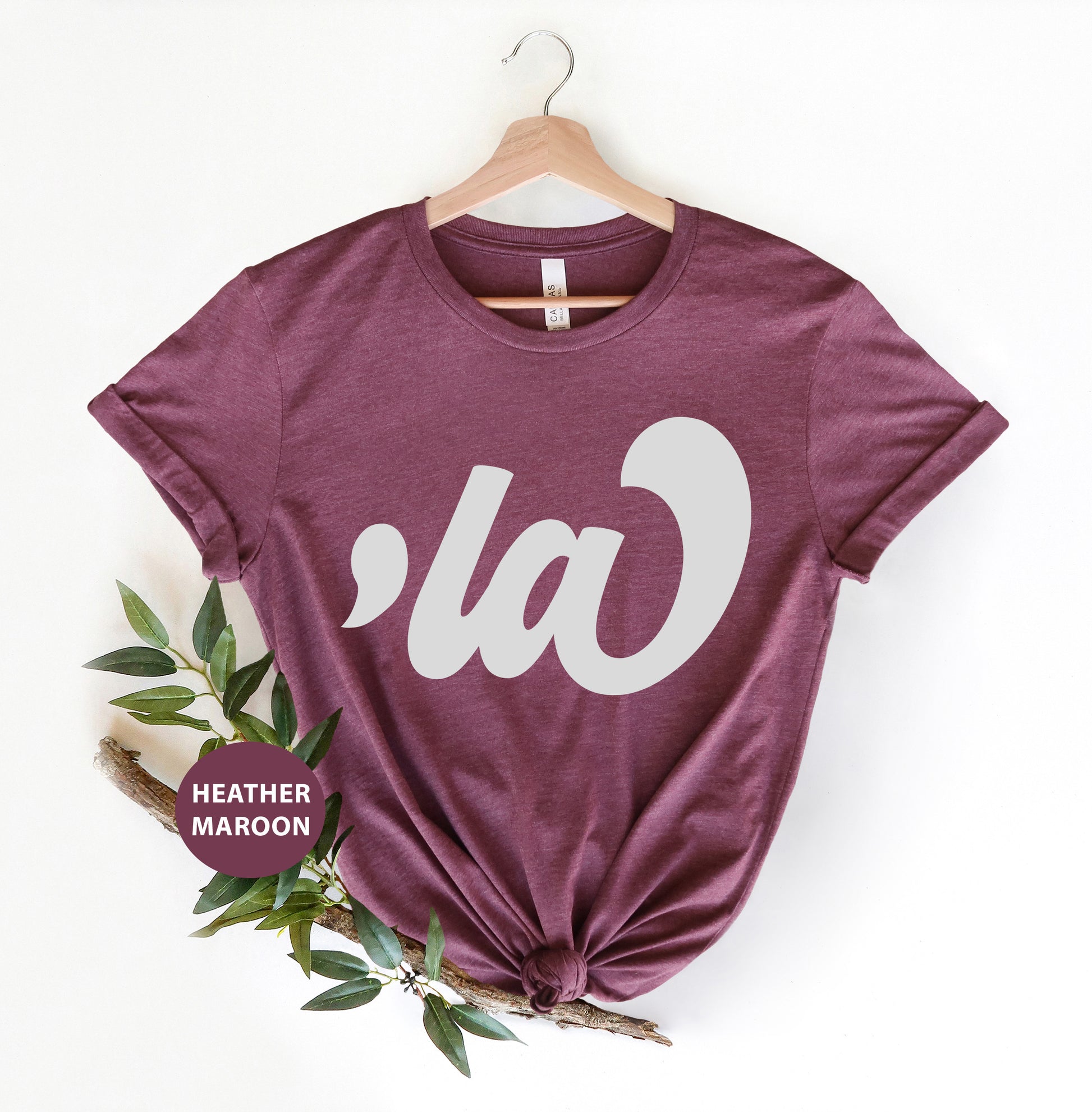 a t - shirt with the word cau on it