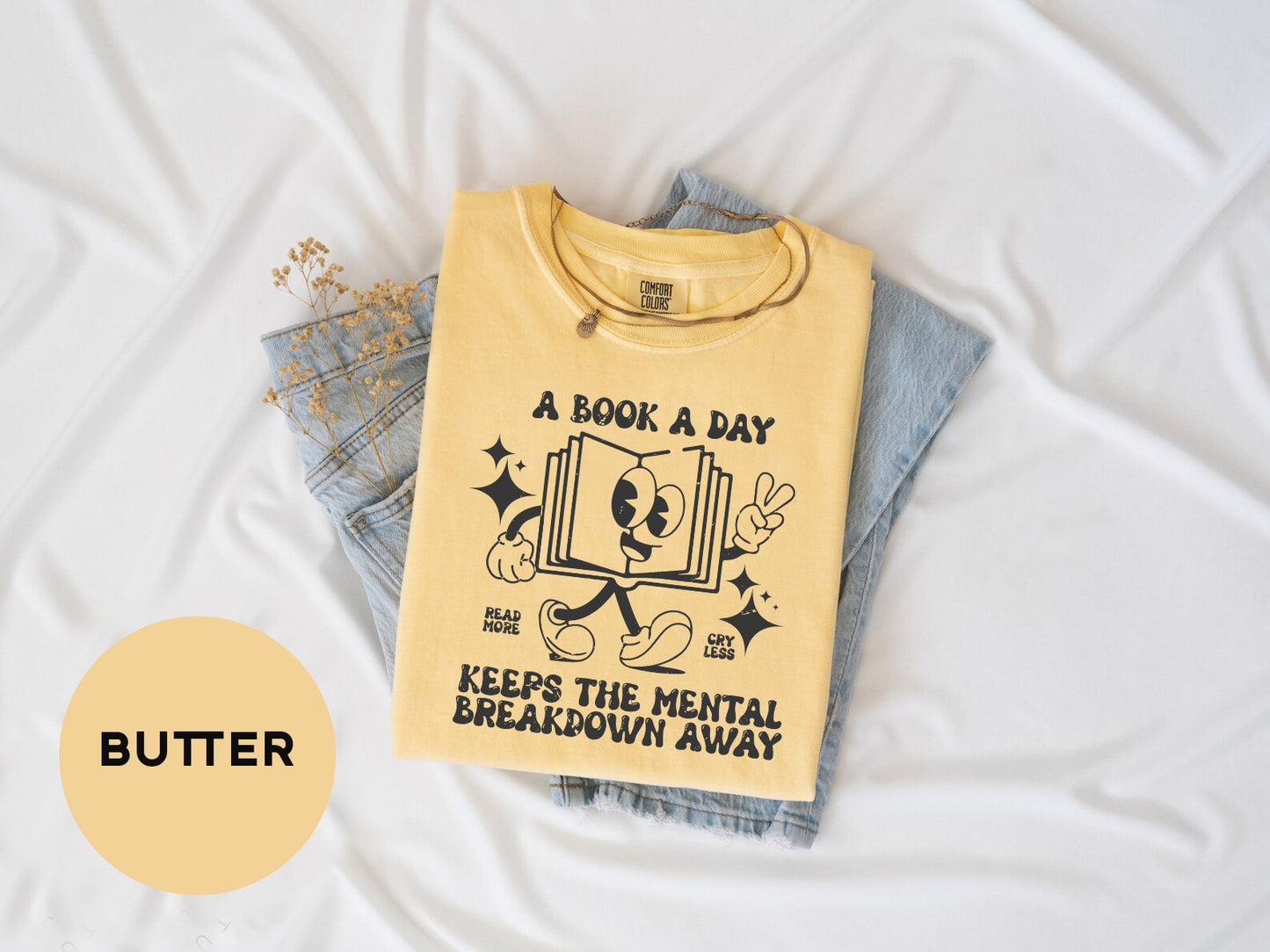 a t - shirt that says a book a day keeps the mental breakdown away