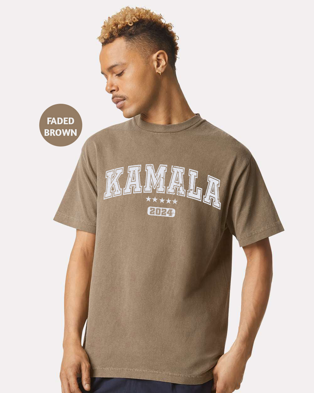 a man wearing a brown t - shirt with the word karma printed on it