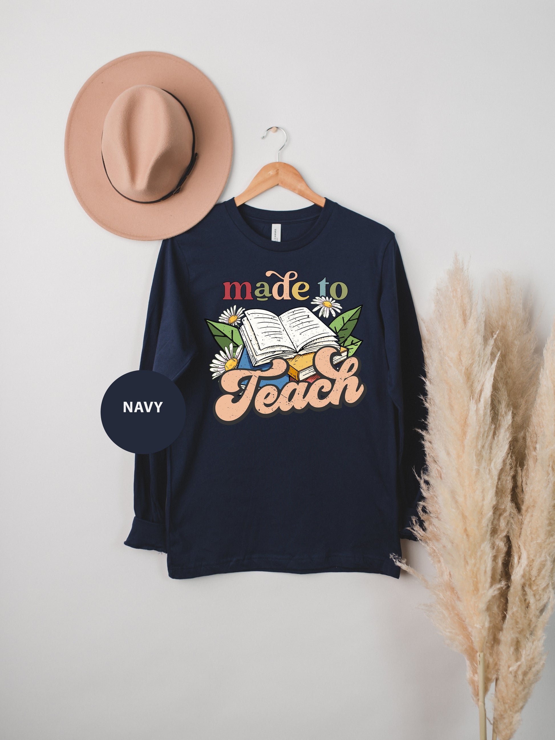 a hat and a t - shirt hanging on a wall