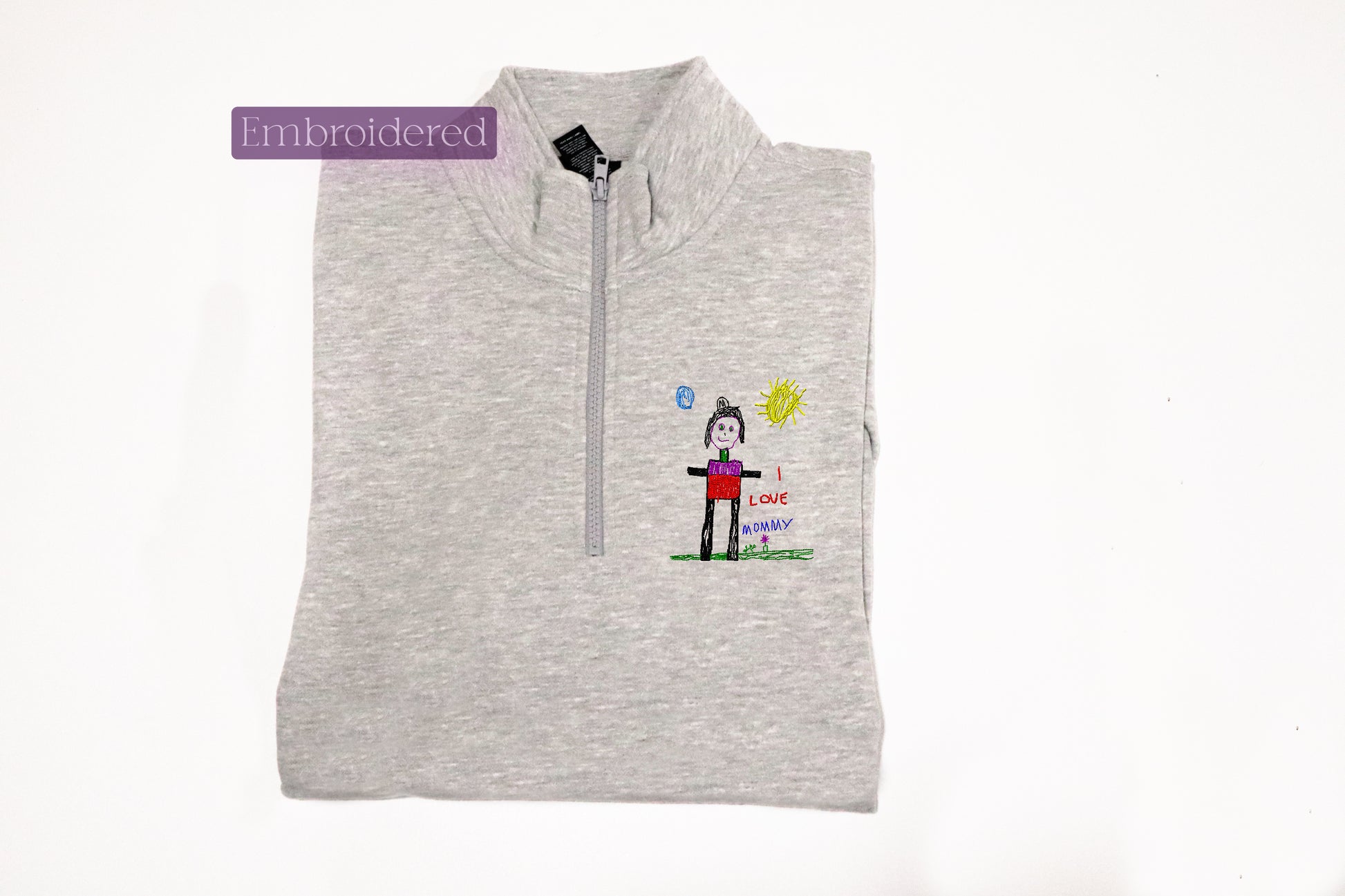 a grey shirt with a picture of a person on it