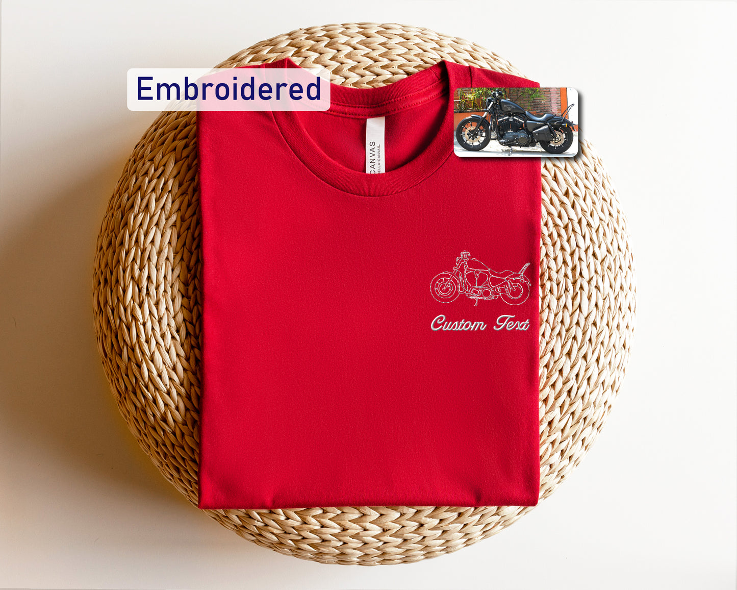 a red t - shirt with a picture of a motorcycle on it