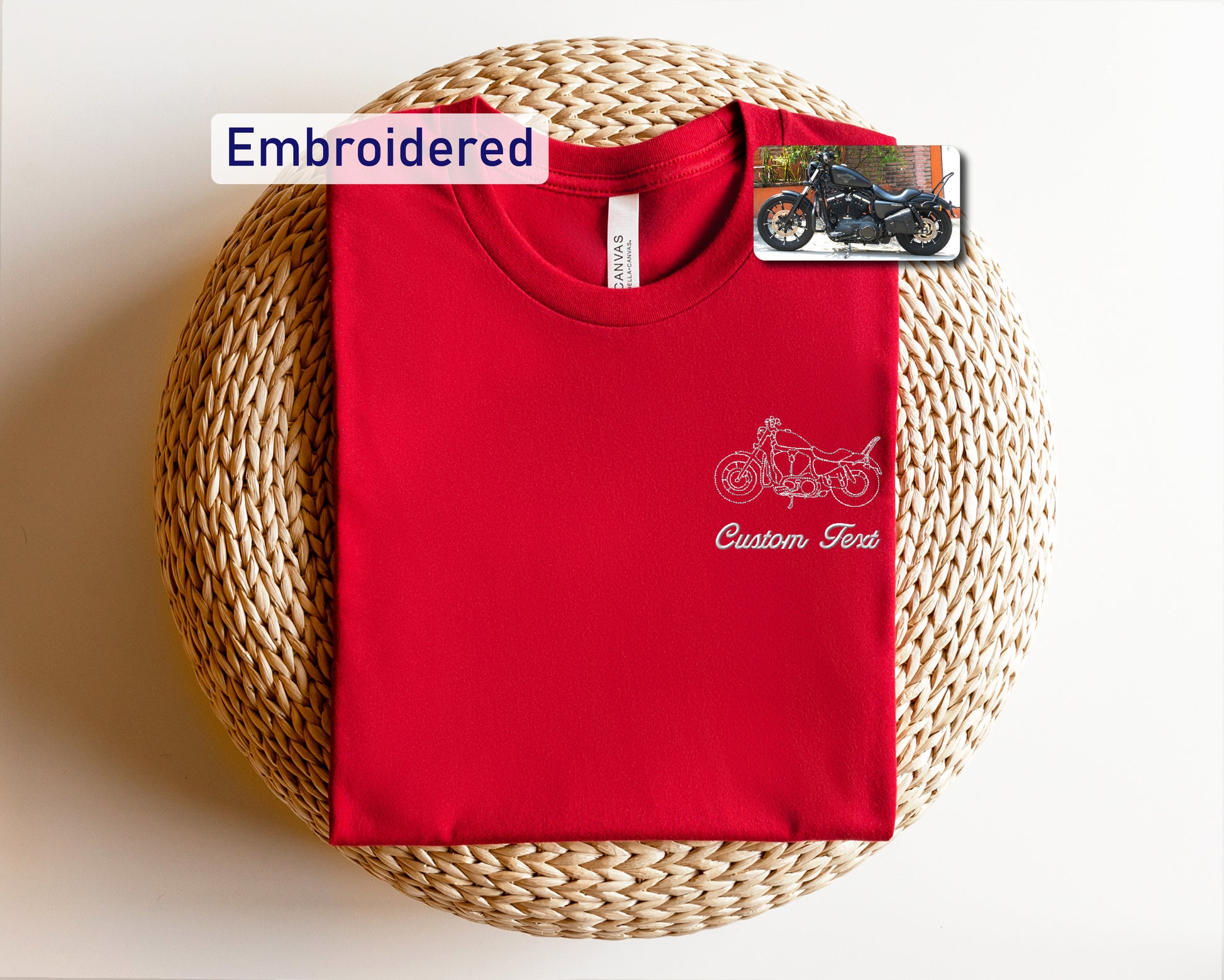 a red t - shirt with a picture of a motorcycle on it
