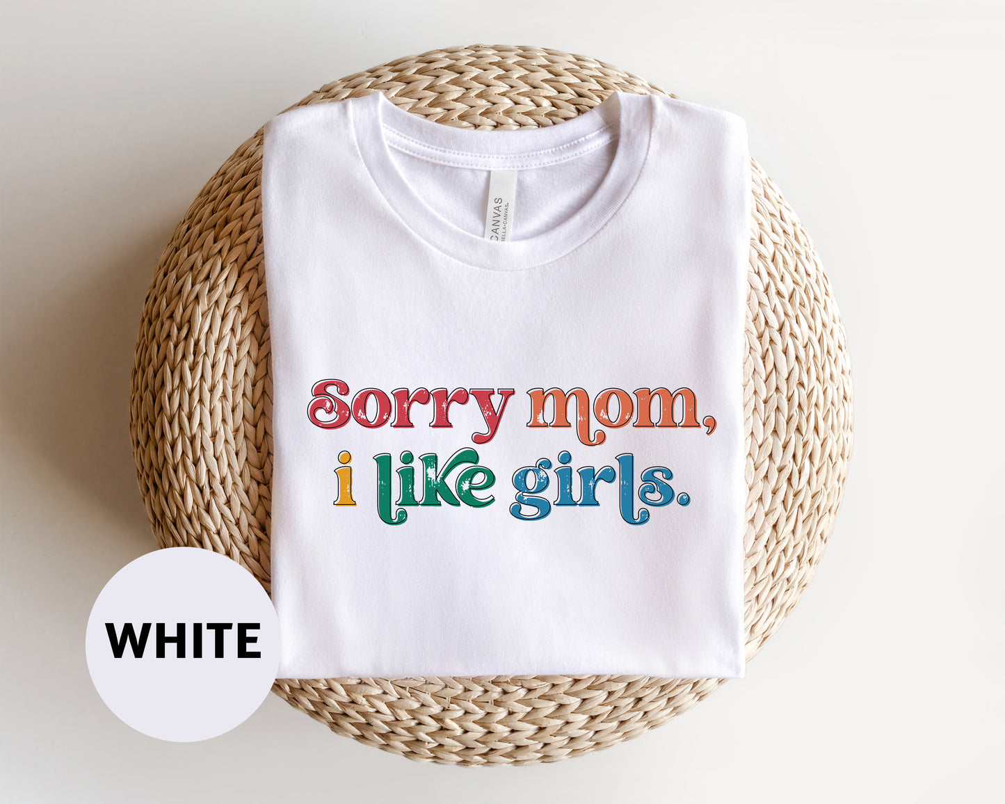 a white t - shirt with the words sorry mom i like girls printed on it