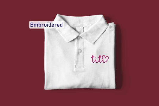 a white polo shirt with the word ted embroidered on it