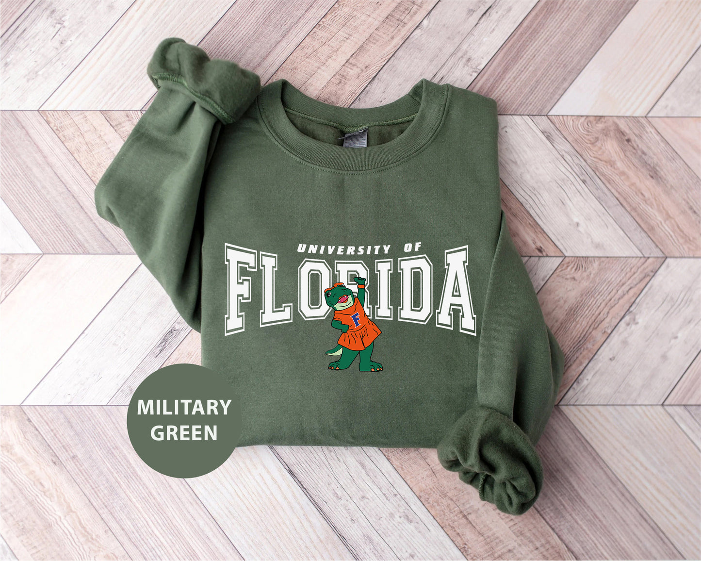 a green sweatshirt with the university of florida mascot on it
