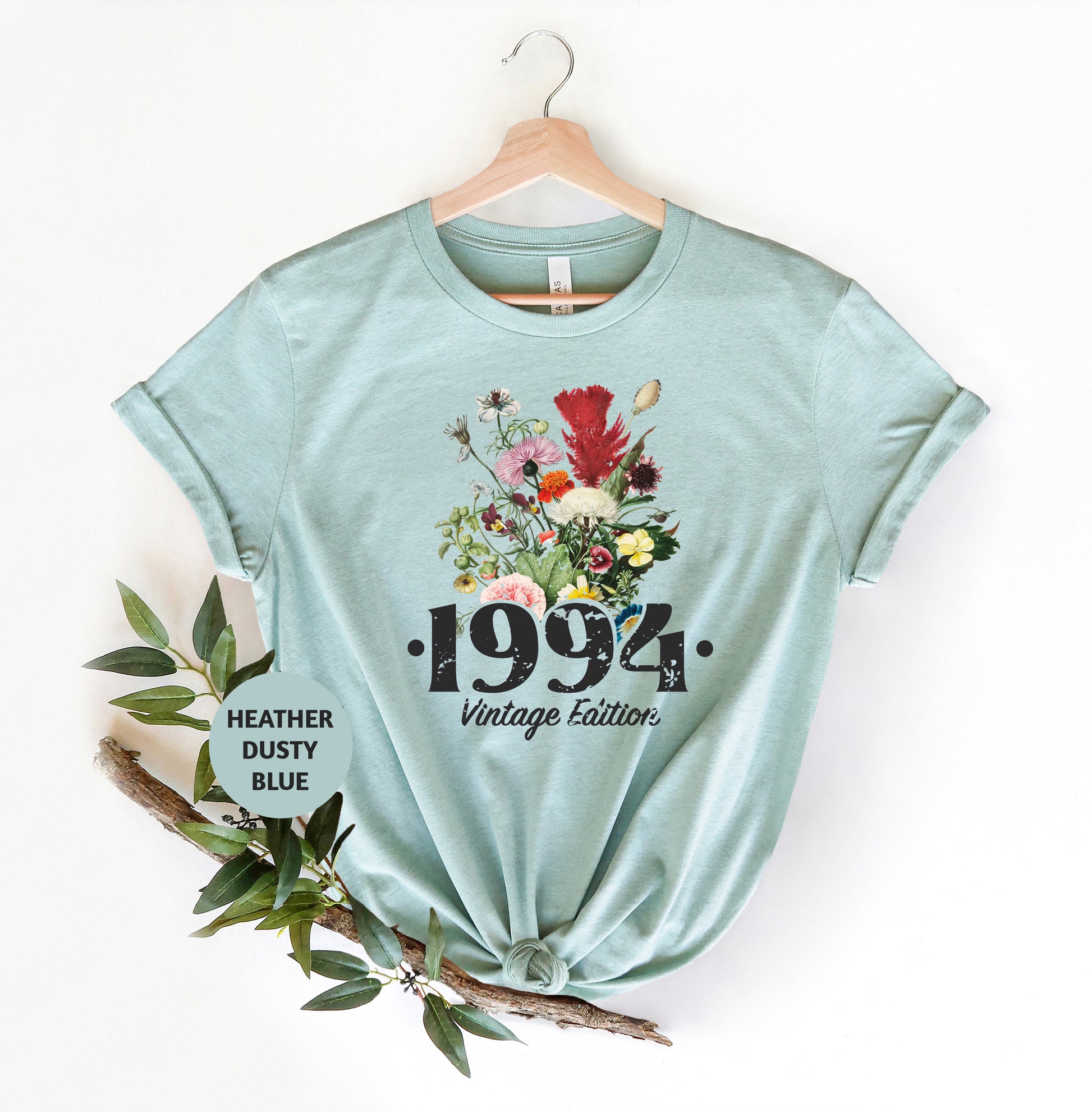 a t - shirt with a picture of a bouquet of flowers on it
