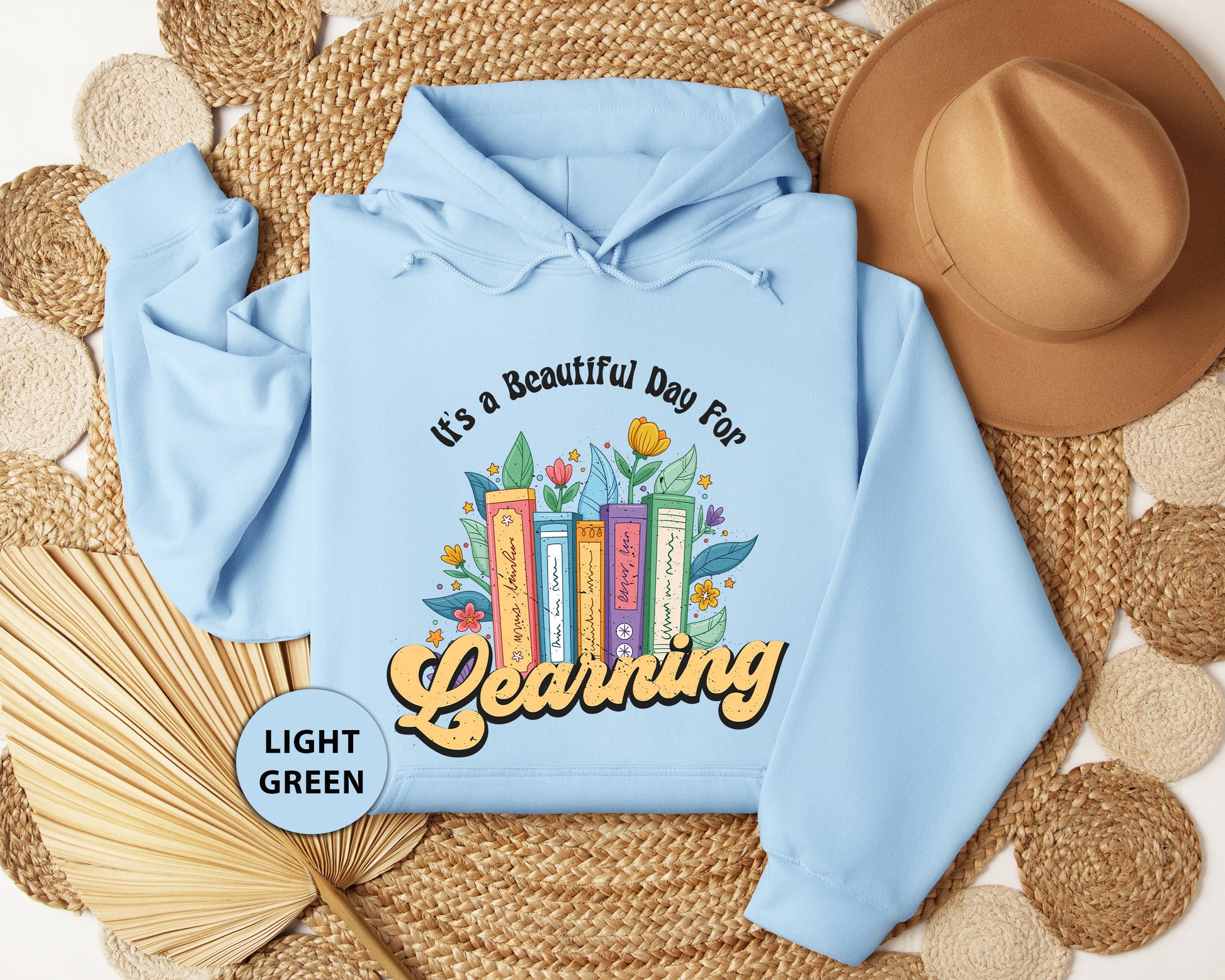 a light blue hoodie with the words granny printed on it