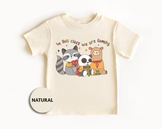 a white t - shirt with a raccoon and bear on it