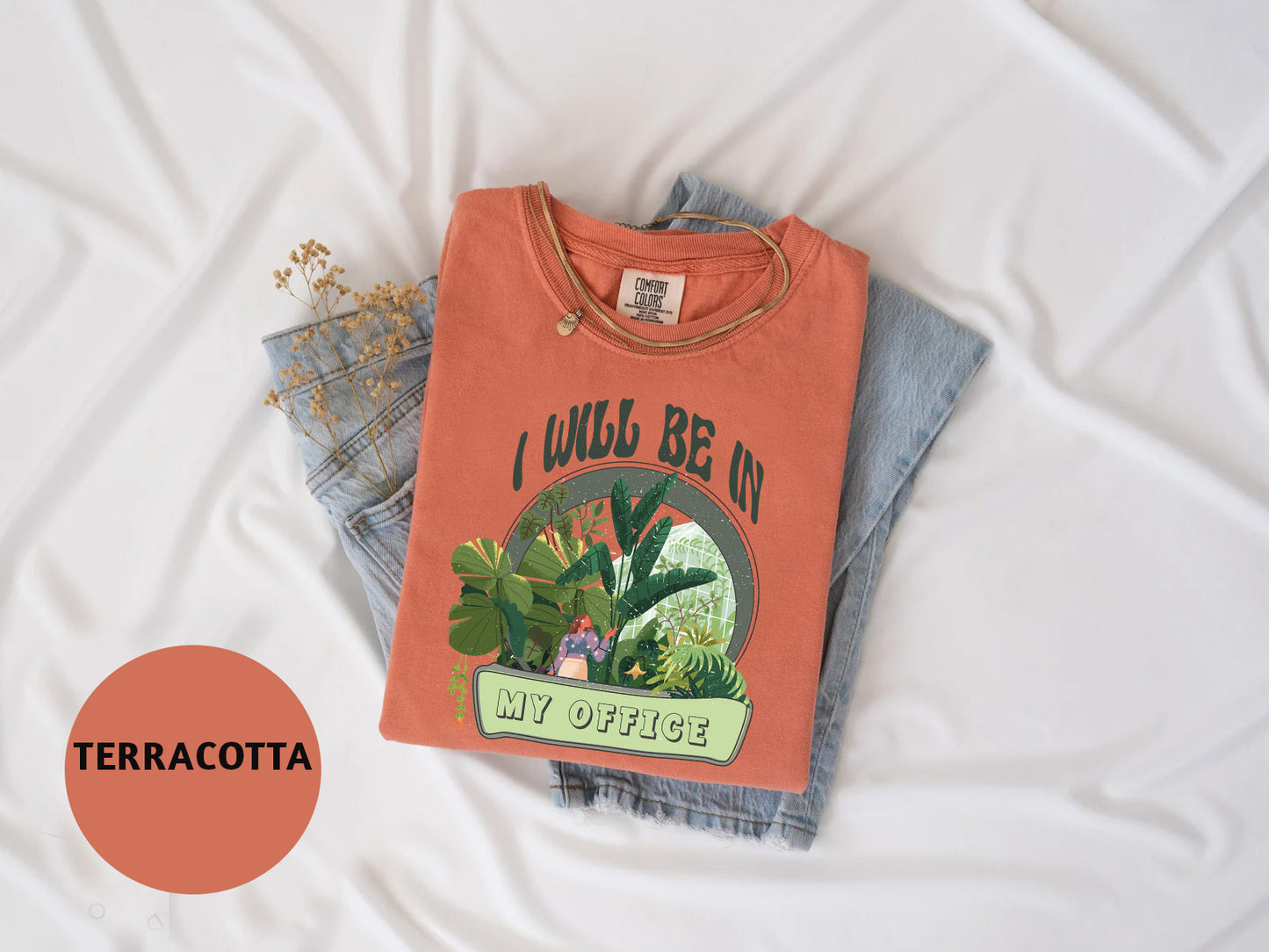 a t - shirt with a picture of a cactus on it