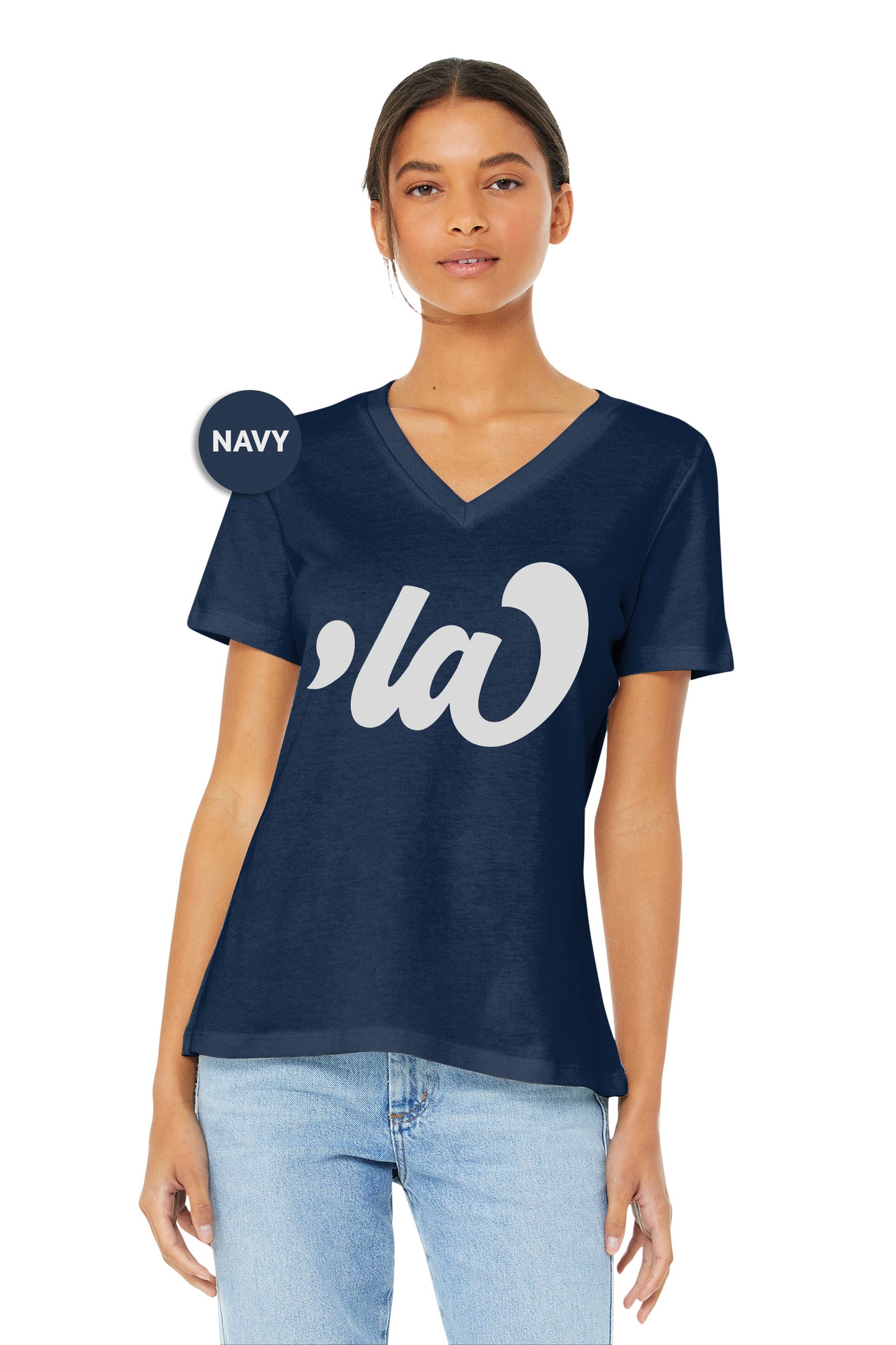 a woman wearing a navy shirt with the word navy on it
