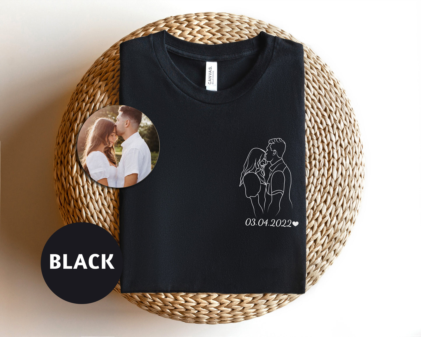 a black t - shirt with a picture of a couple on it
