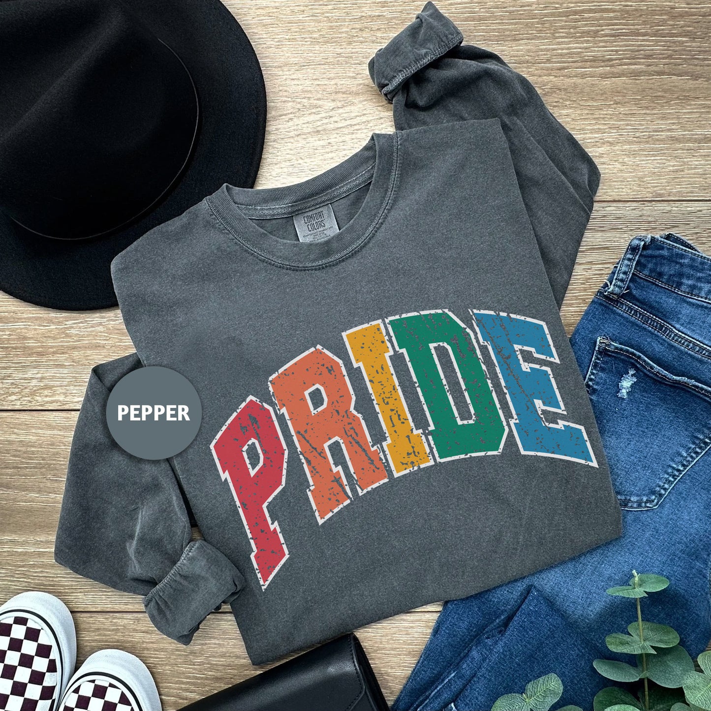 a pair of jeans, a hat, and a t - shirt with the word