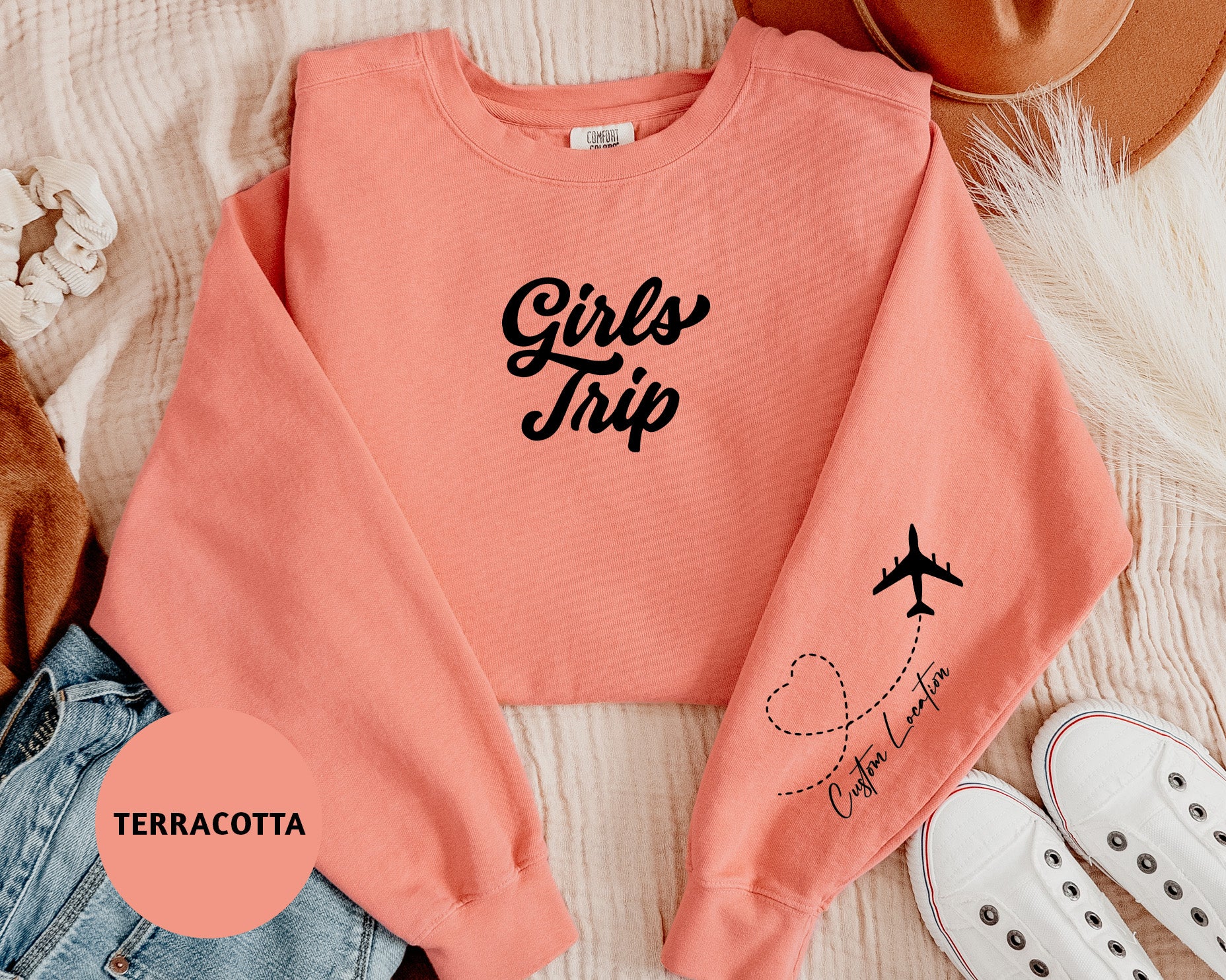 a girl's pink sweatshirt with the words girls trip on it