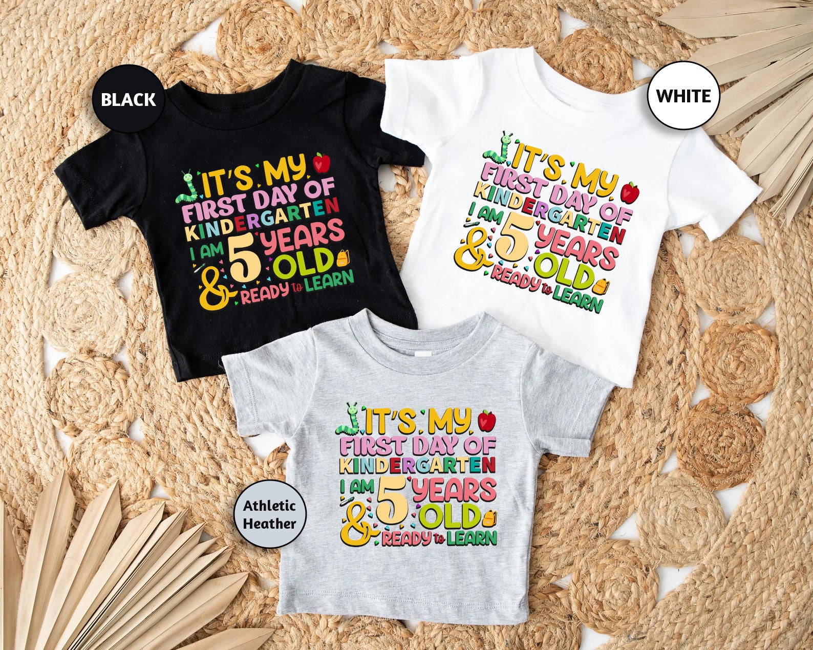 three t - shirts that say it's my first day of school