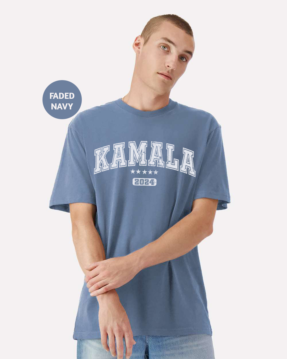 a young man wearing a blue shirt with the word kalamala printed on it