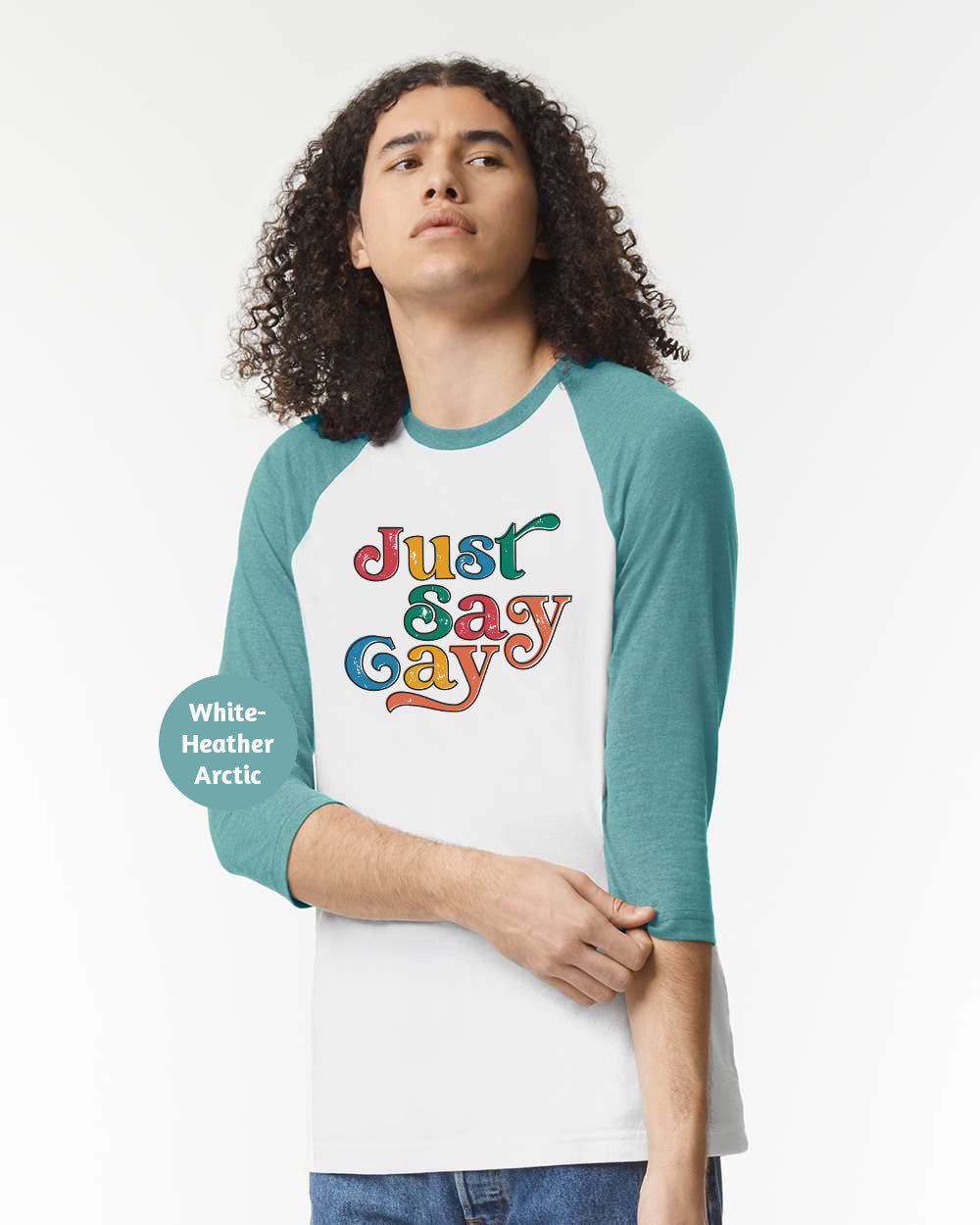 a man with long hair wearing a white and blue shirt