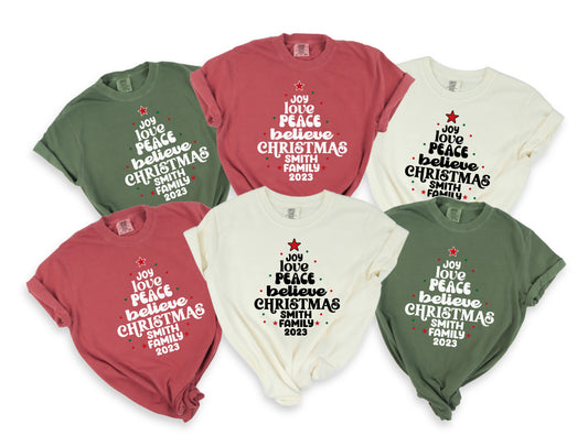 six t-shirts with Christmas-themed text and designs, arranged in two rows of three.