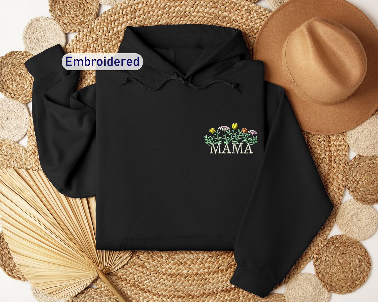 a black hoodie with the word mamma printed on it