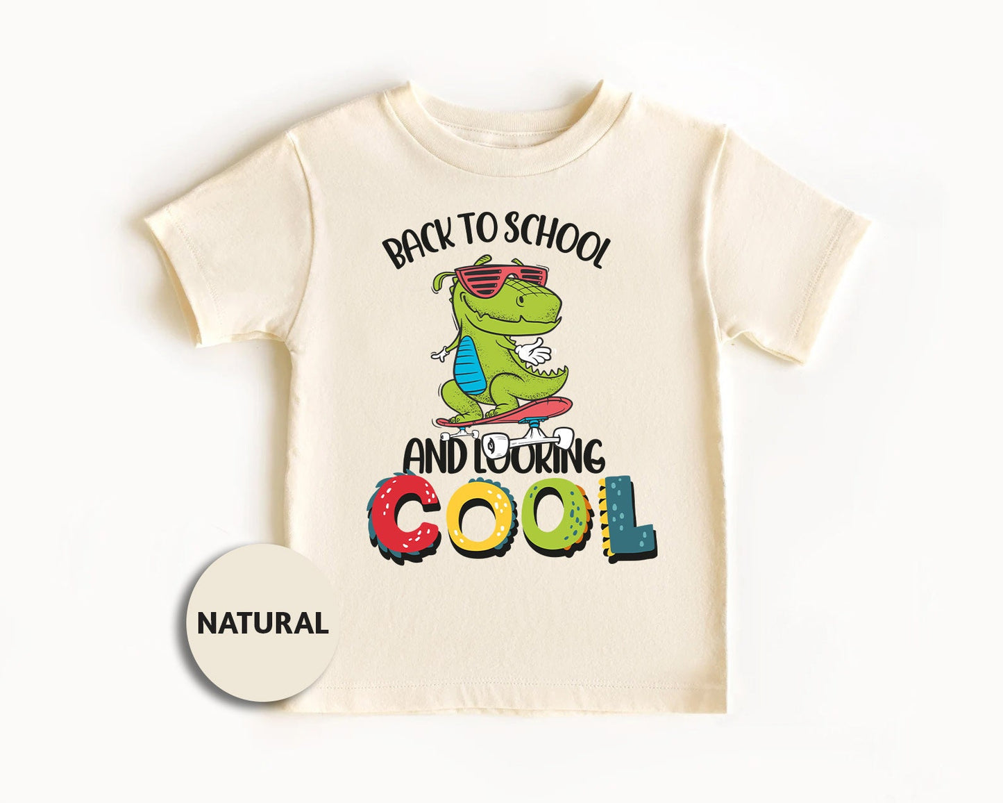 a white t - shirt with the words back to school and rocking cool on it