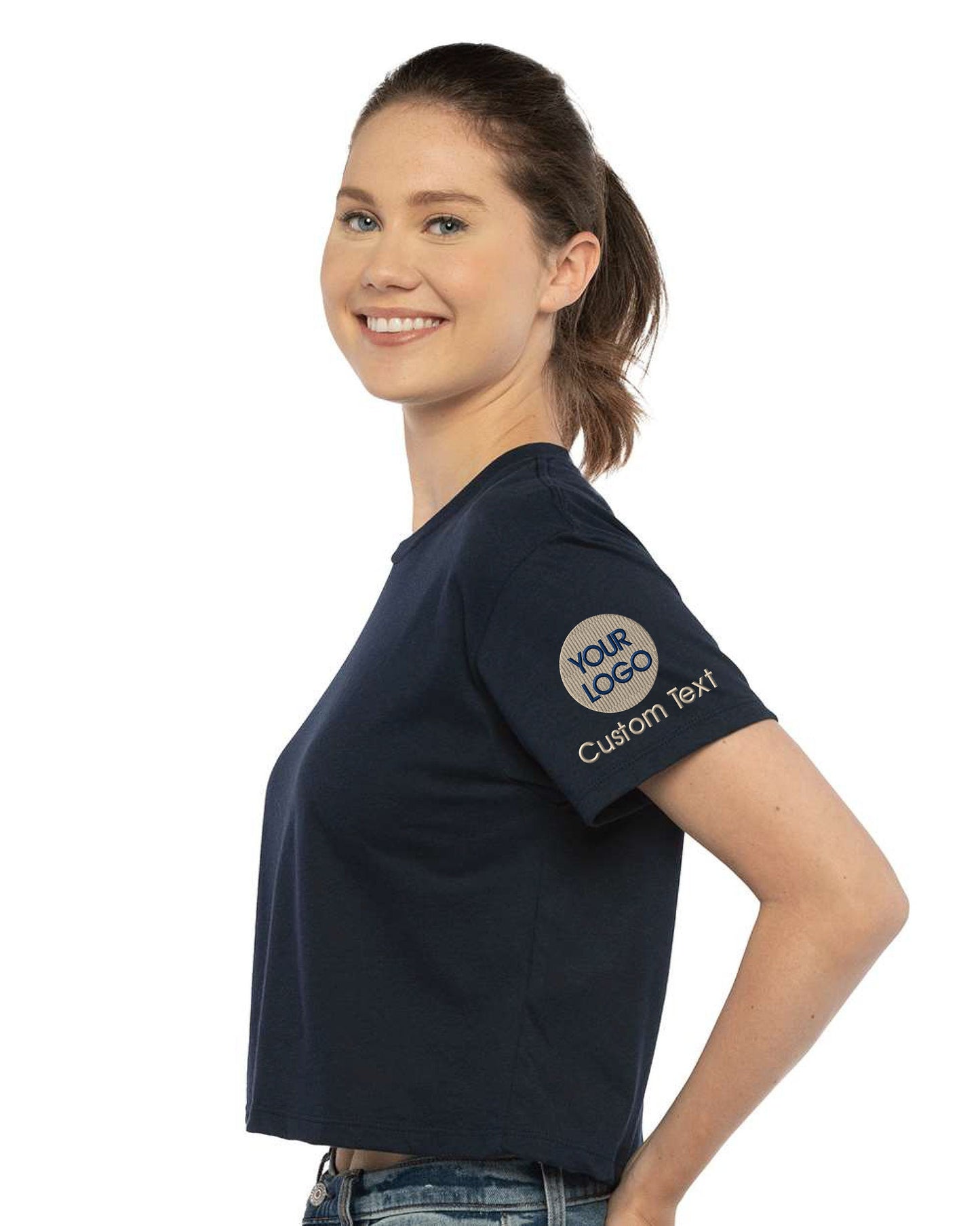 a woman wearing a blue shirt and jeans