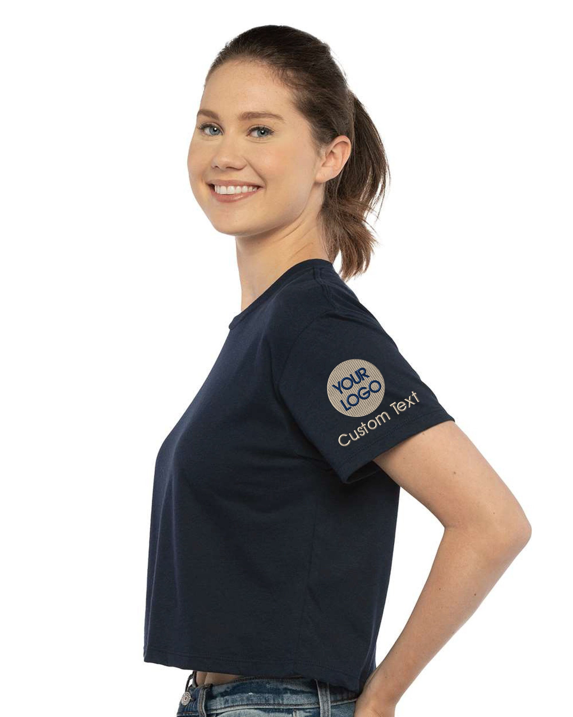 a woman wearing a blue shirt and jeans