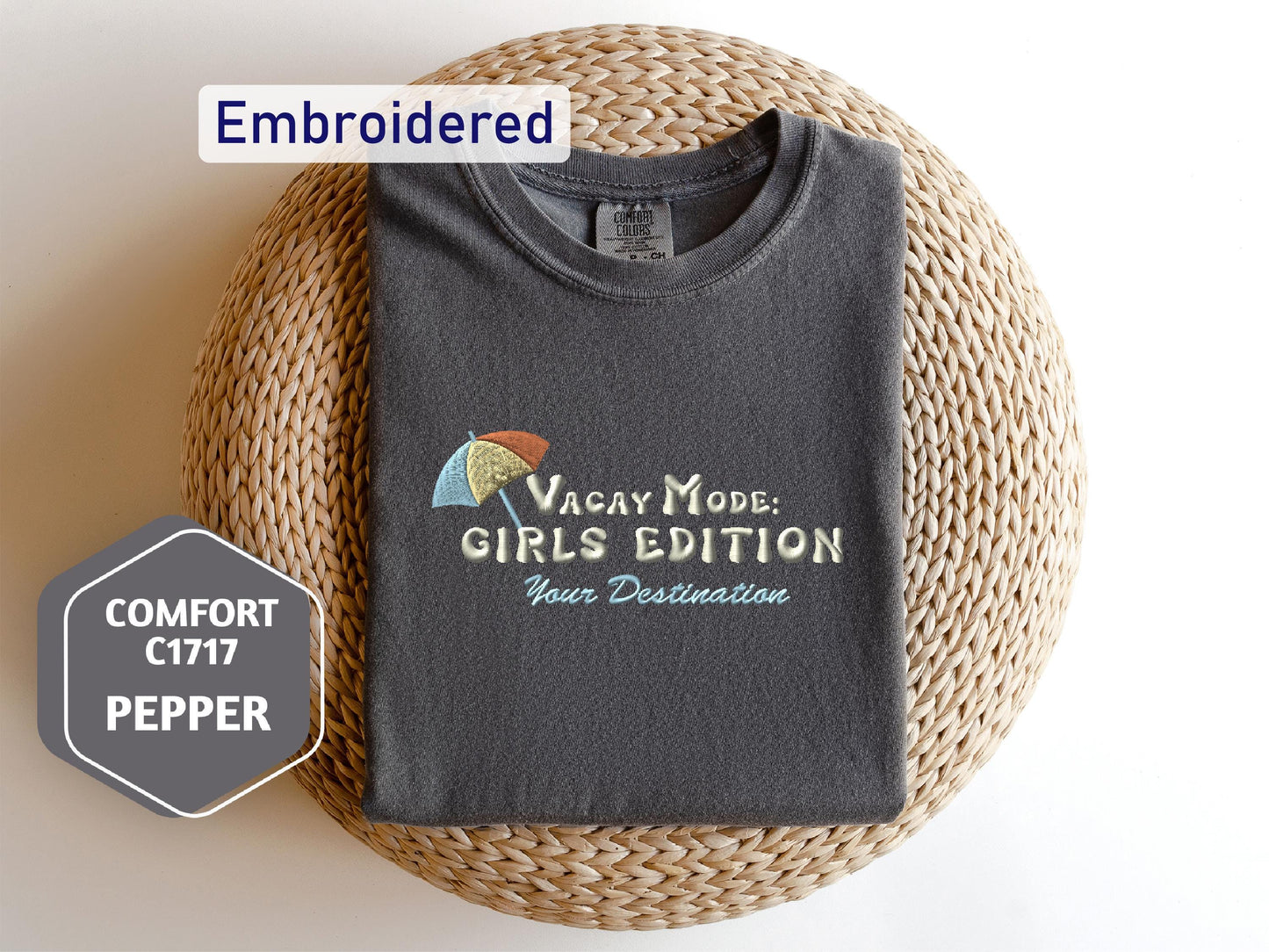 a t - shirt that is sitting on top of a wicker basket