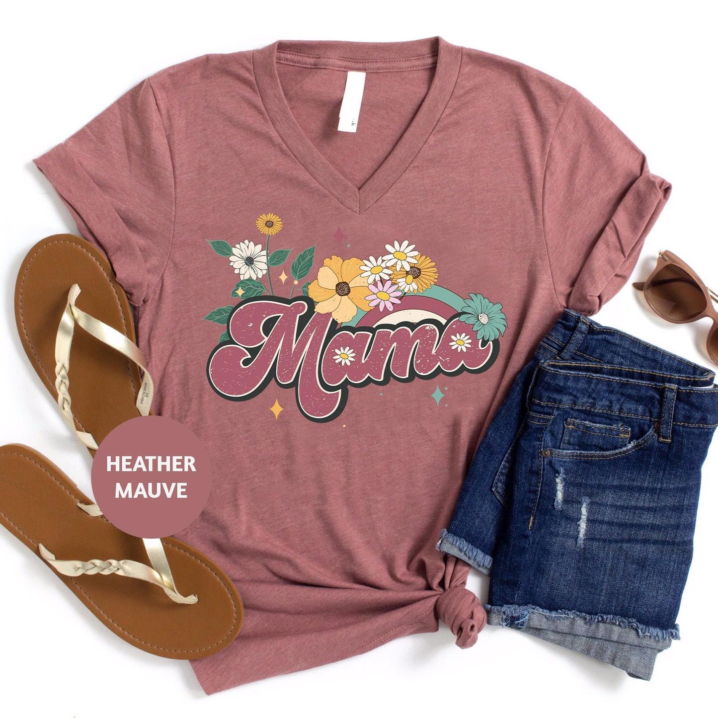 a women's t - shirt with the word mama on it