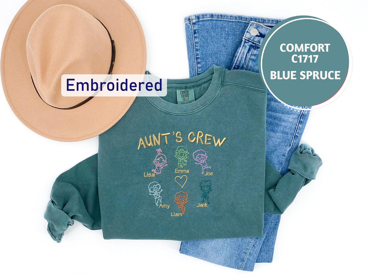 a pair of jeans and a t - shirt with a hat on top of it