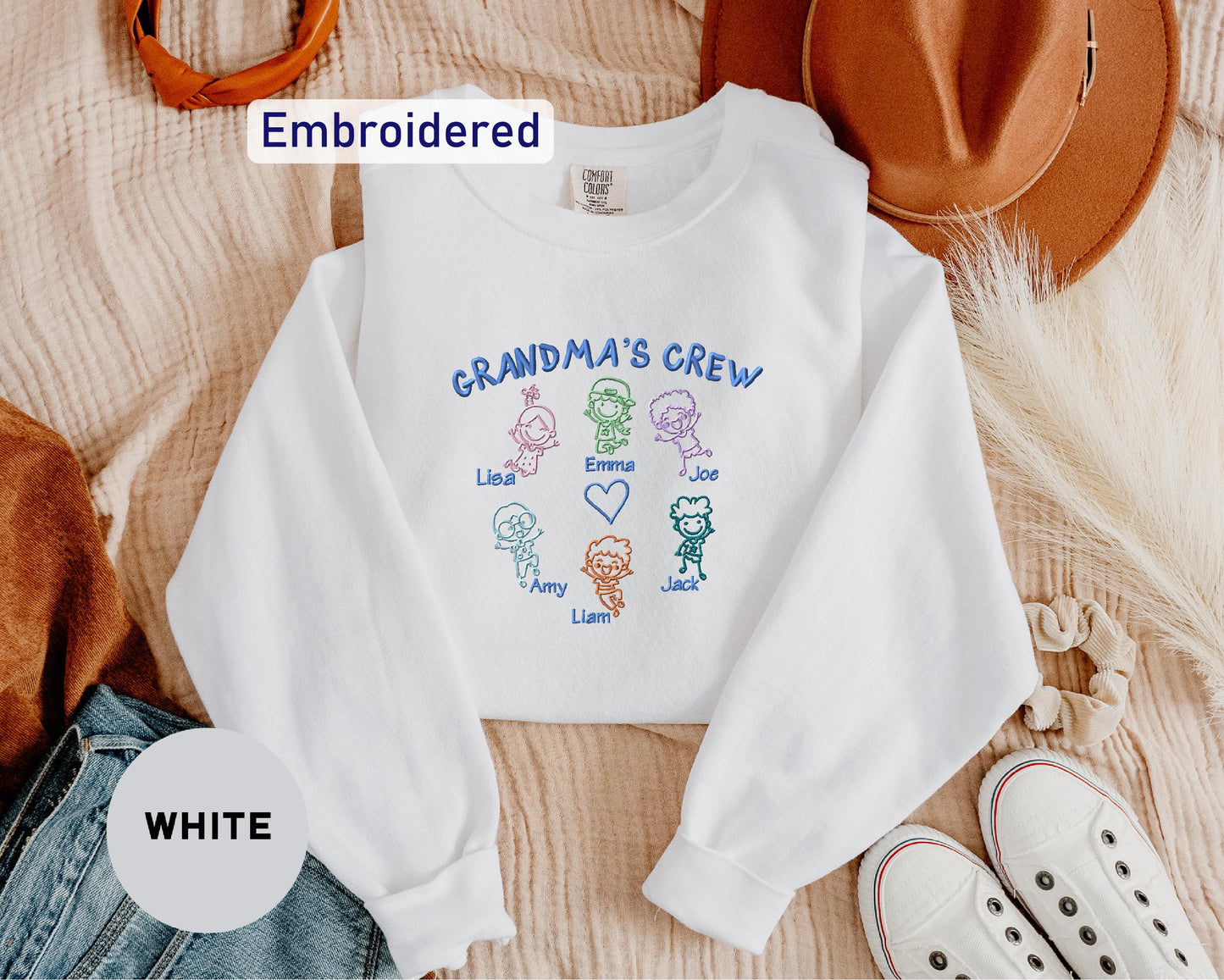 a white shirt with the words grandma's crew on it
