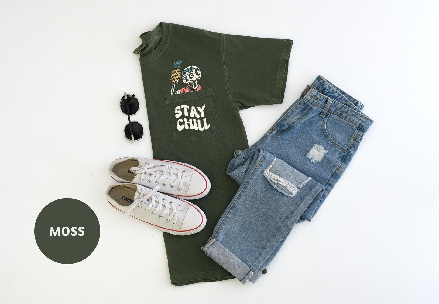 a pair of jeans, a t - shirt, sunglasses, and a pair of