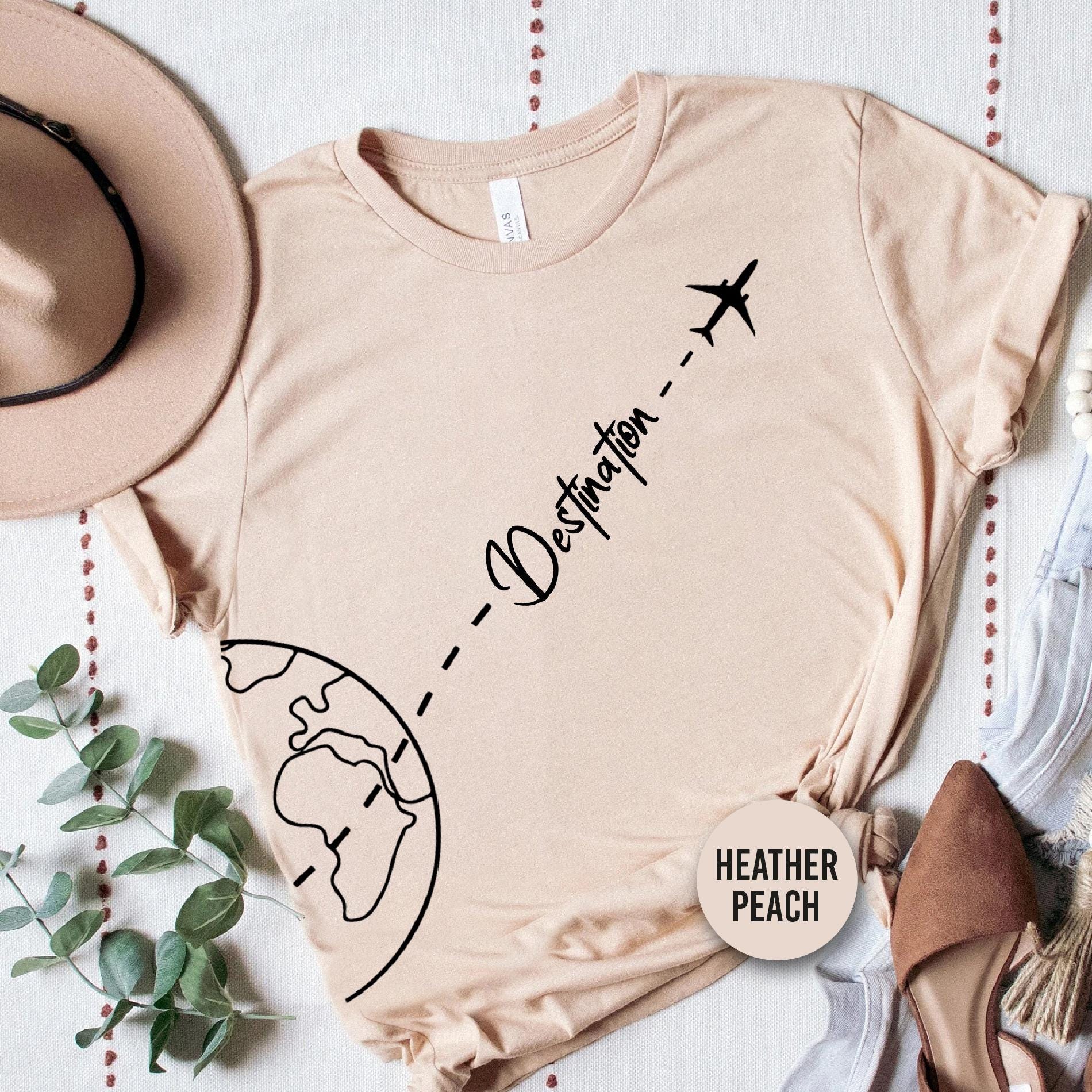 a t - shirt with a picture of a plane on it