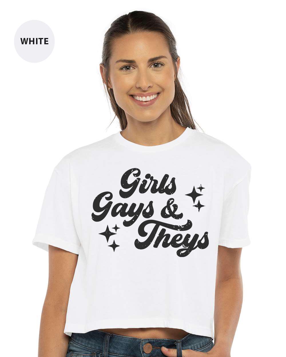 a woman wearing a white crop top that says girls, guys and they
