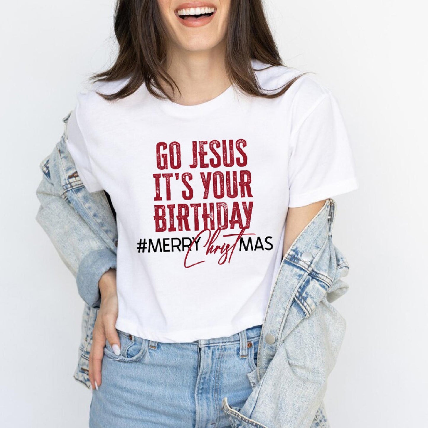 a woman wearing a t - shirt that says go jesus it's your birthday