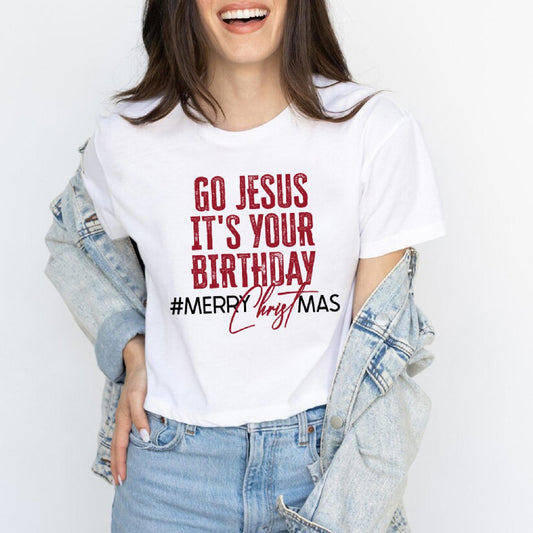 a woman wearing a t - shirt that says go jesus it's your birthday