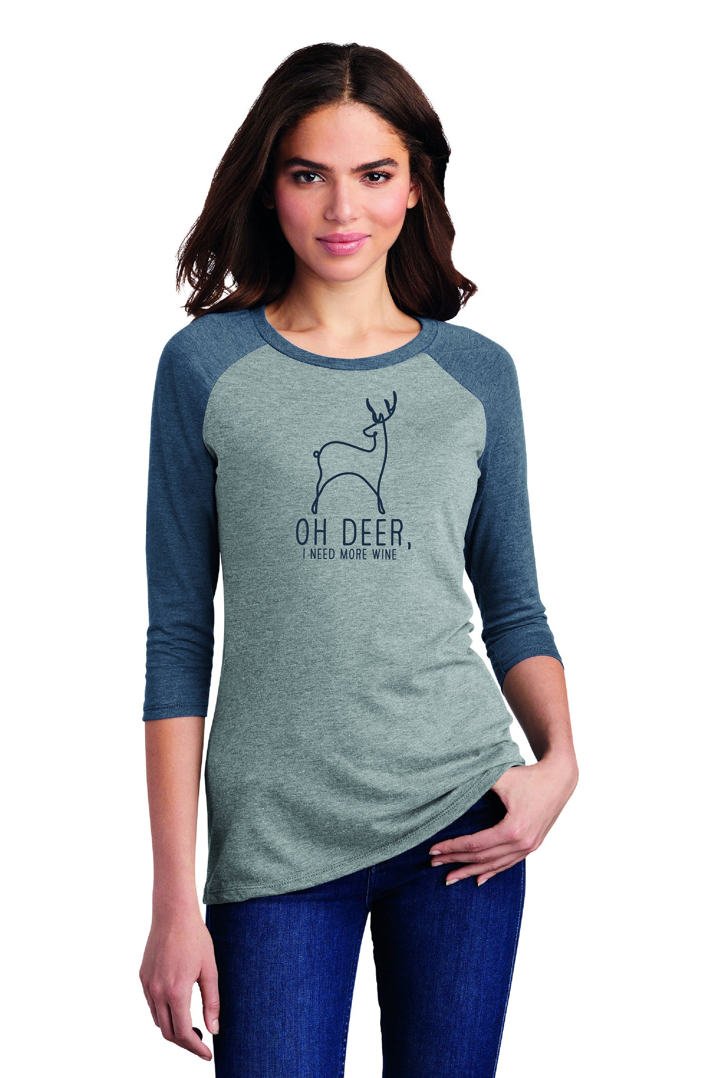 a woman wearing a grey and blue shirt with a deer on it