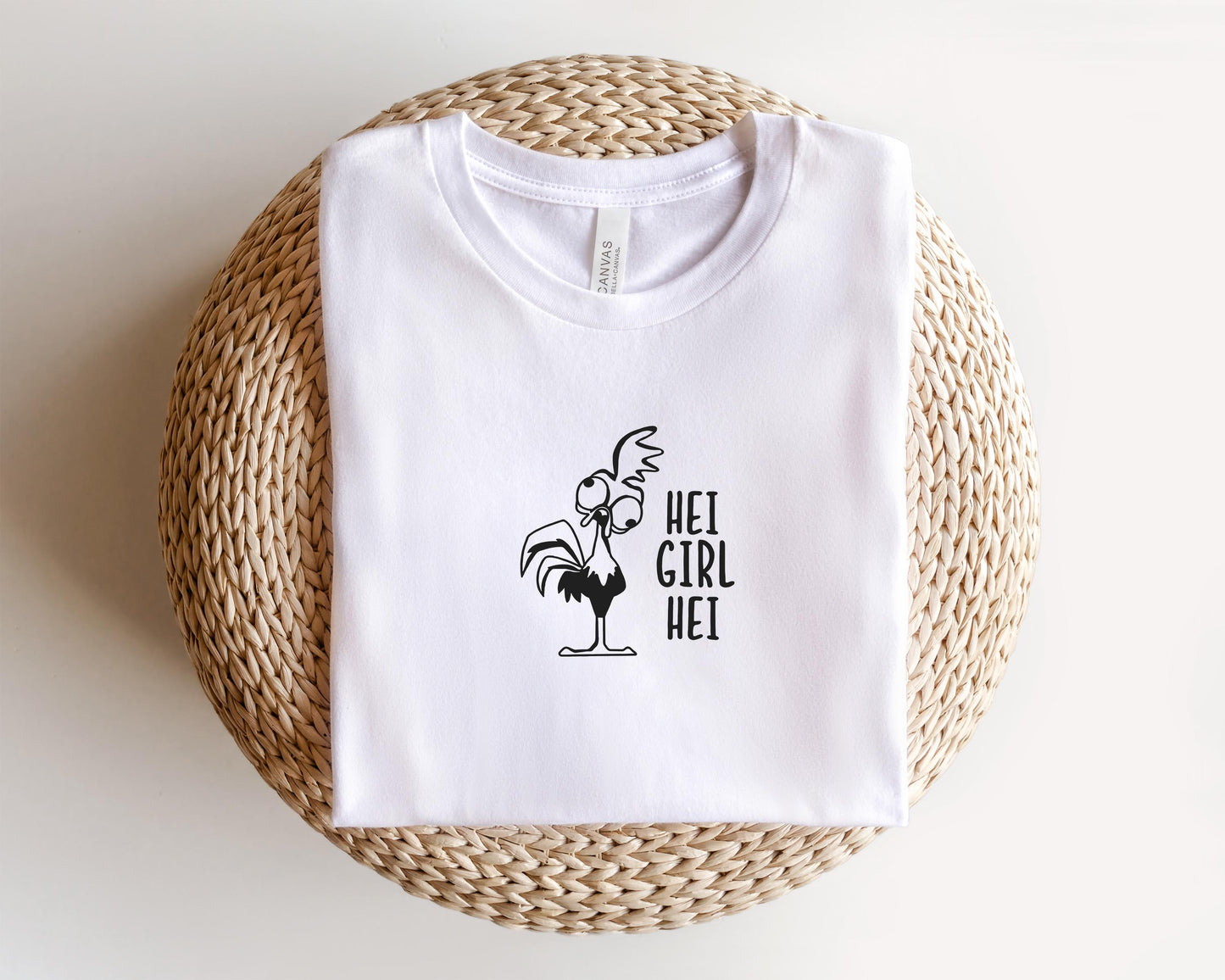a white t - shirt with the words hey girl hey printed on it