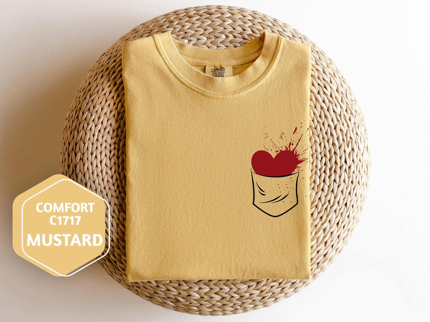 a t - shirt with a picture of a heart in a pocket