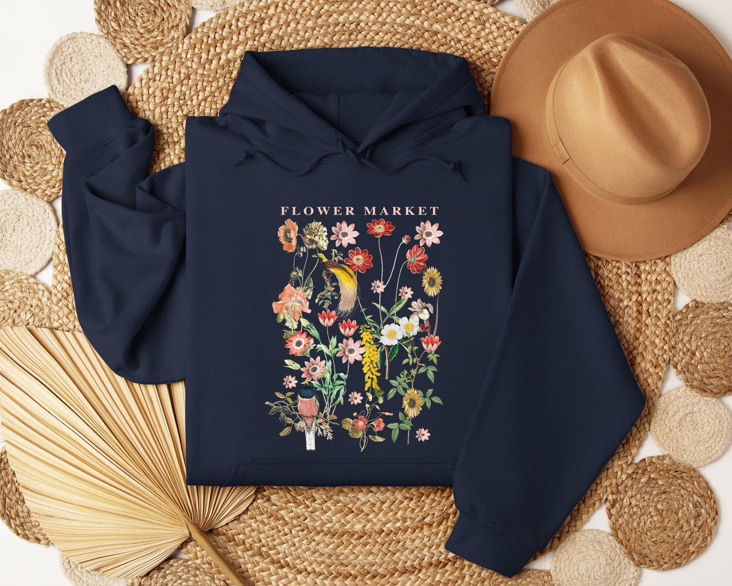 a hoodie with a flower market design on it