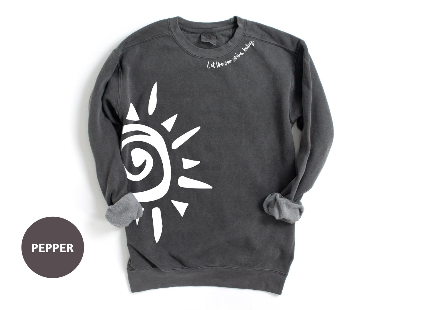 a black sweatshirt with a white sun on it