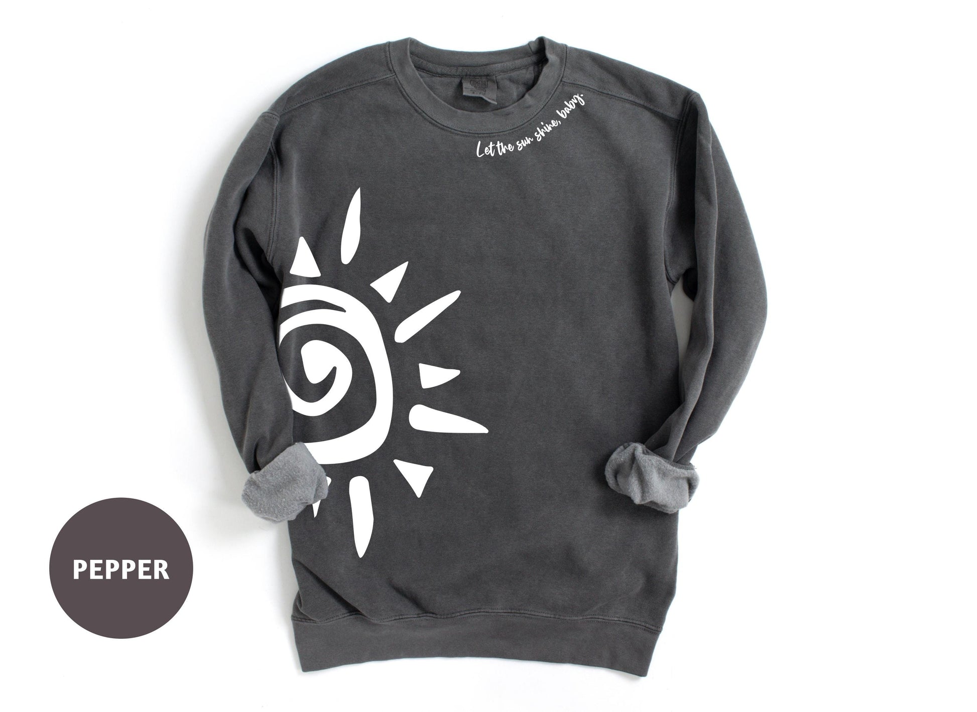 a black sweatshirt with a white sun on it