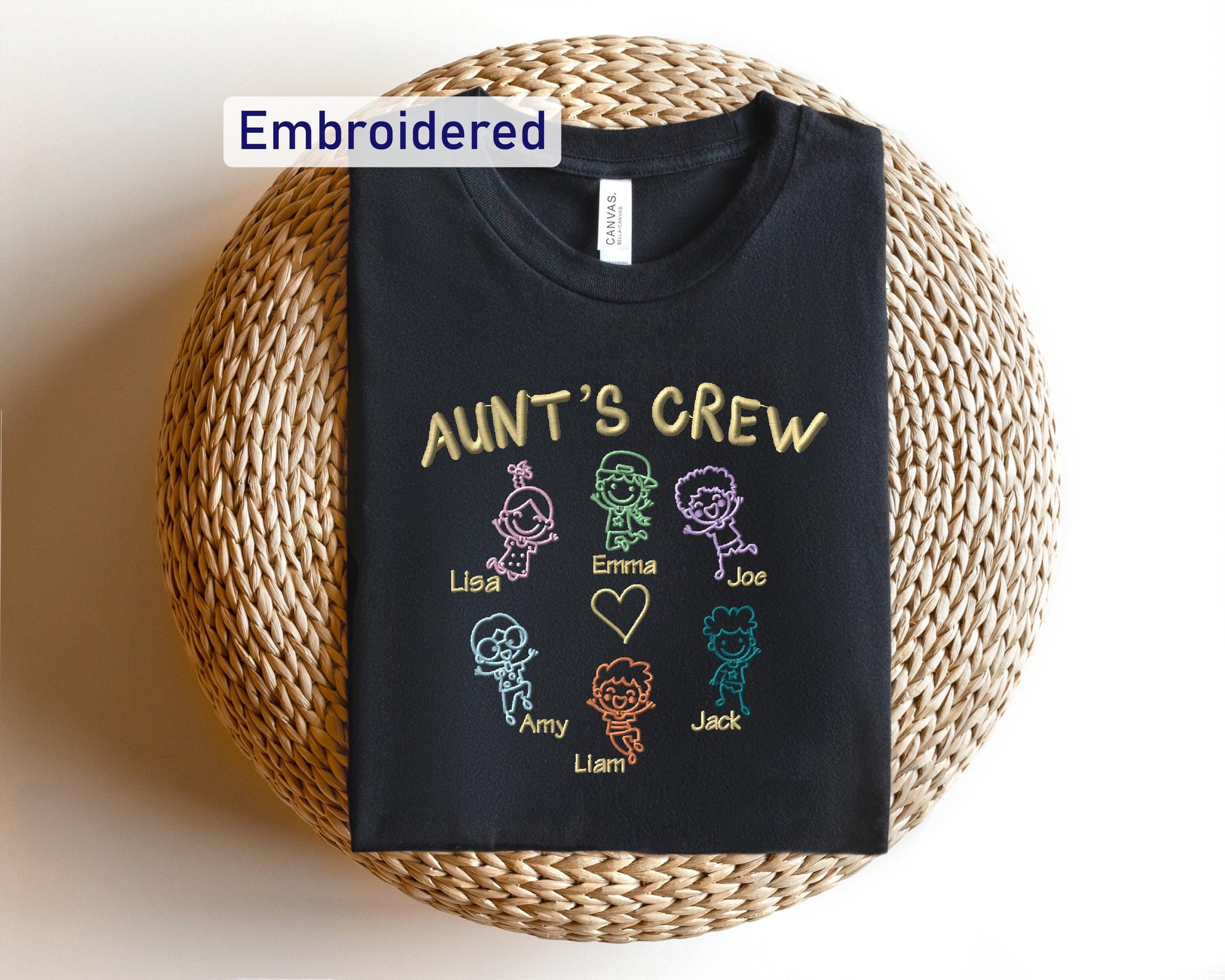 an adult's crew t - shirt on a wicker basket