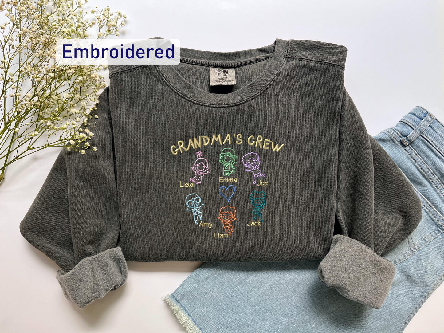 a gray shirt with the words grandma's crew on it